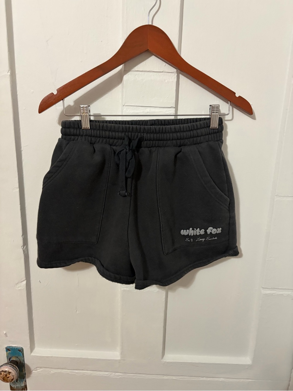 White Fox Boutique Offstage Lounge shorts in charcoal gray.